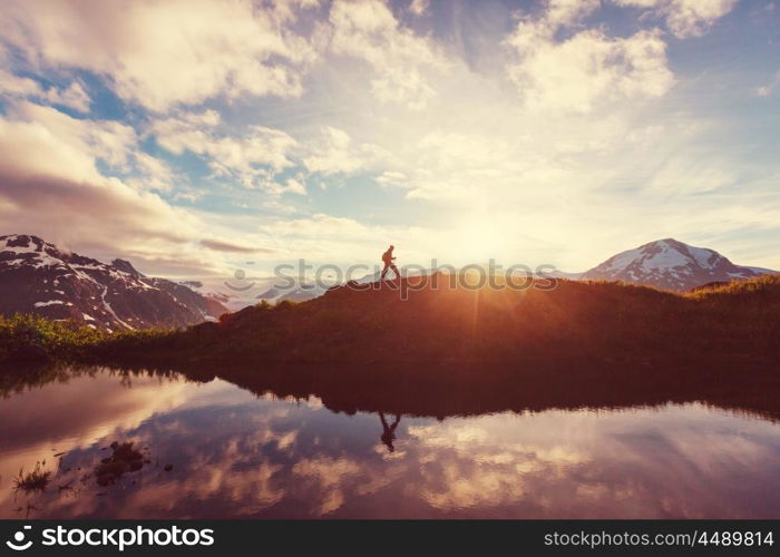 Hiking man in the mountains