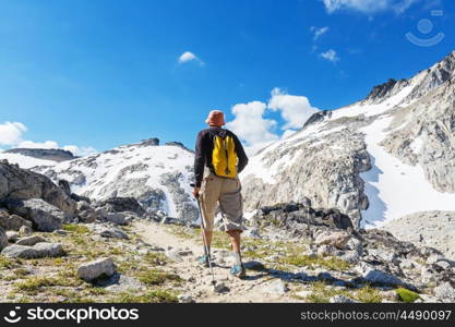 Hiking man in the mountains