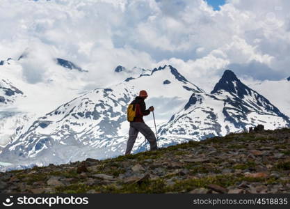 Hiking man in the mountains