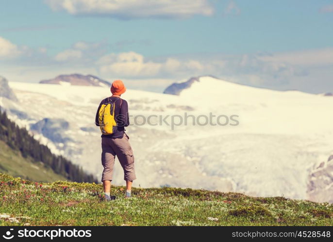 Hiking man in the mountains