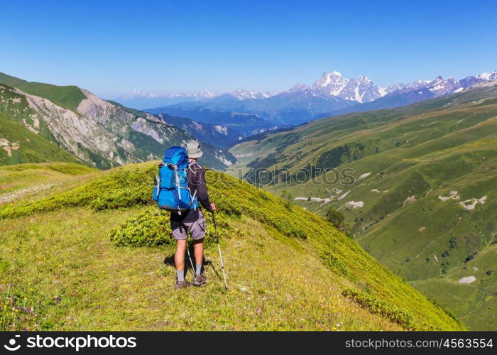 Hiking man in the mountains