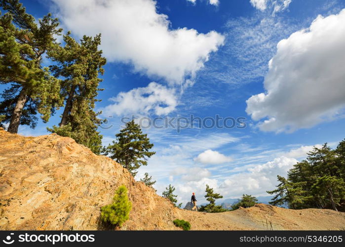 Hiking man in the mountains