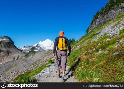 Hiking man in the mountains