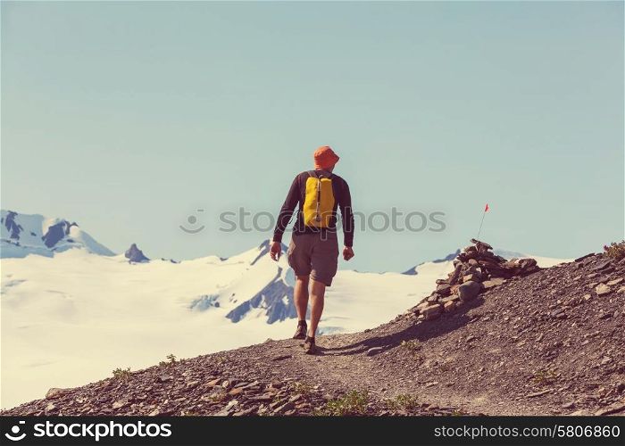 Hiking man in the mountains
