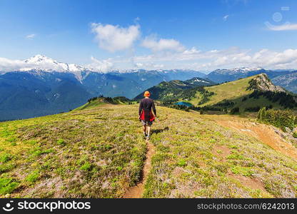 Hiking man in the mountains