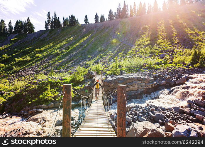 Hiking man in the mountains