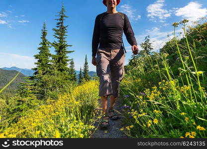 Hiking man in the mountains