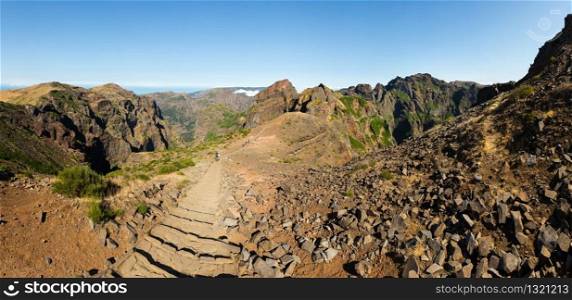 Hiking path high in mountains, Portugal, Madeira. Mountains landscape