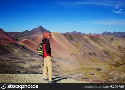 Hiking scene in Vinicunca, Cusco Region, Peru. Montana de Siete Colores, Rainbow Mountain.
