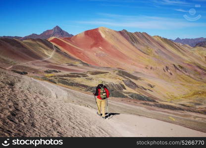 Hiking scene in Vinicunca, Cusco Region, Peru. Montana de Siete Colores, Rainbow Mountain.