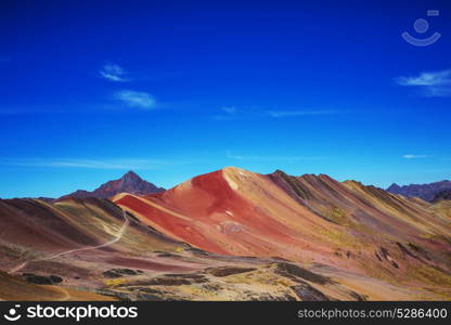 Hiking scene in Vinicunca, Cusco Region, Peru. Montana de Siete Colores, Rainbow Mountain.