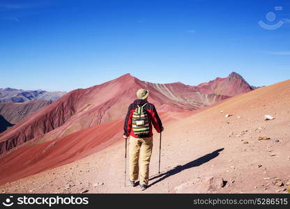 Hiking scene in Vinicunca, Cusco Region, Peru. Montana de Siete Colores, Rainbow Mountain.