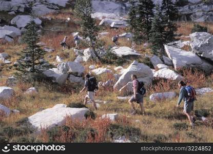 Hiking With A Group Through The Rocky Wilderness