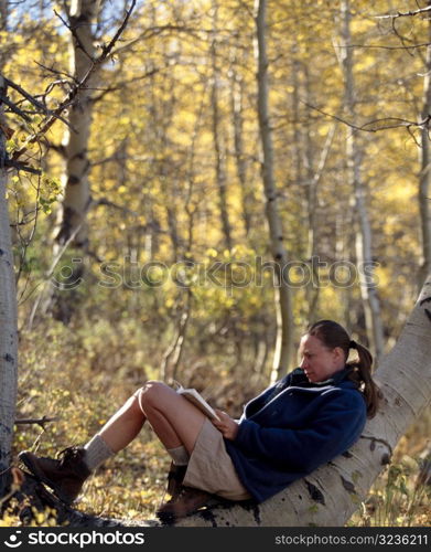 Hiking Woman Reading Outdoors