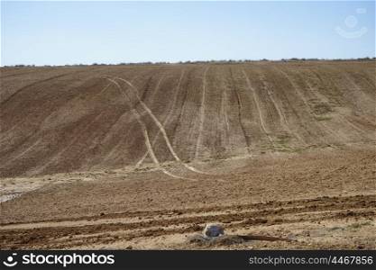Hill and plowed land