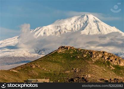 Hill landscape at morning in Armenia with Ararat mountain at background. View on Turkey from Armenia.