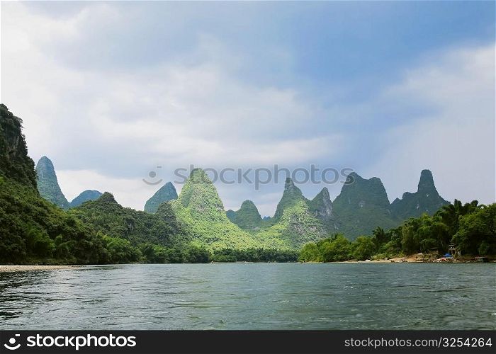 Hills along a river, Guilin Hills, XingPing, Yangshuo, Guangxi Province, China