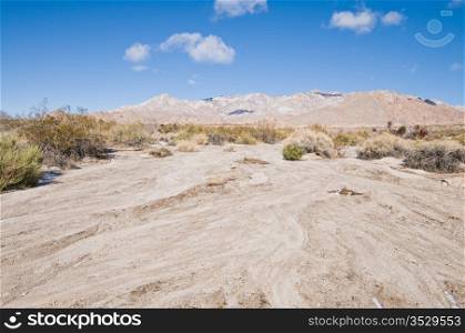 Hills and field dusted with snow, Mojave National Preserve, California