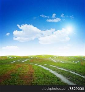 Hills and roads. Hills and roads. Summer good weather nature background. Hills and roads