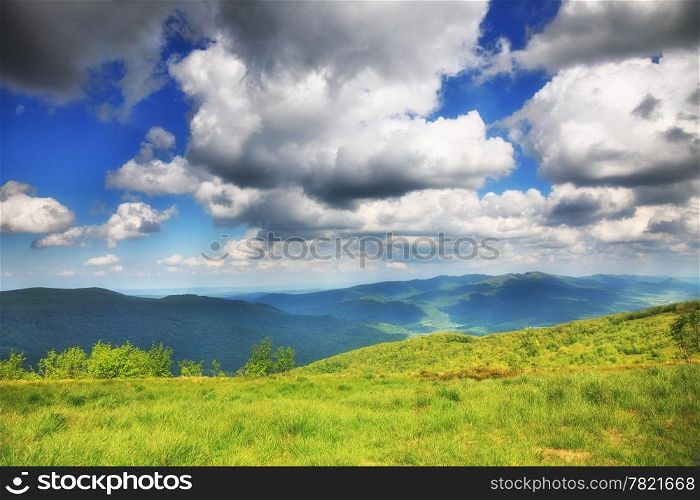 Hills beautiful summer landscape in the mountains blue sky with clouds Bieszczady Poland