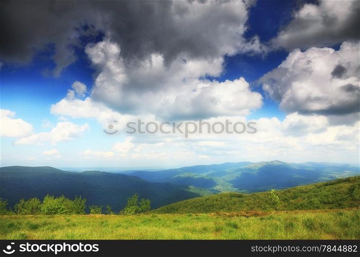 Hills beautiful summer landscape in the mountains blue sky with clouds Bieszczady Poland