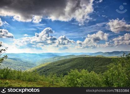 Hills beautiful summer landscape in the mountains dark sky with clouds Bieszczady Poland