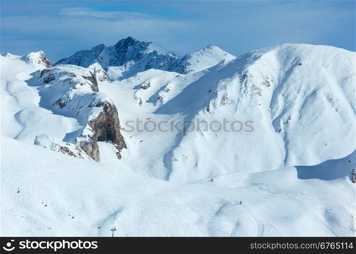 Hillside freaked ski tracks. Winter Silvretta Alps, Austria.