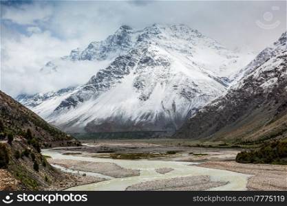 Himalayan landscape scenery in Lahaul valley in Himalayas with snowcapped mountains. Himachal Pradesh, India. Lahaul valley in Himalayas with snowcappeped mountains. Himachal Pradesh, India