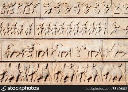 Hindu temple wall with ornate carving, Asia