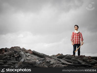 Hipster guy with bat. Young hipster guy with bat on hill top