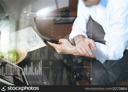 hipster hand using smart phone and laptop compter,holding credit card payments online business,sitting on sofa in living room,green apples in wooden tray,virtual interface screen