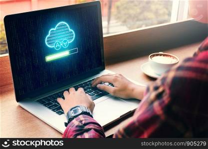 Hipster man hand using laptop with cloud computing and uploading files on cloud network server.