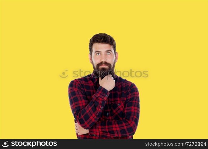 Hipster man with big beard on a yellow background. Generation 2018