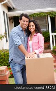 Hispanic couple moving into new house