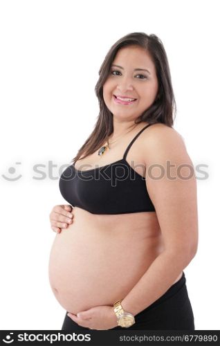 hispanic pregnant woman smiling and touching her belly