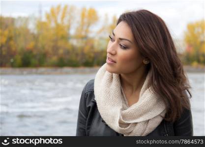 Hispanic woman outdoors on a fall day
