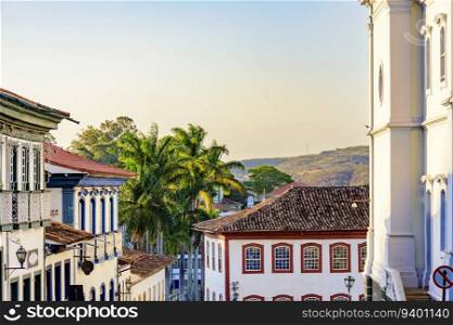 Historic center of the city of Diamantina with its colonial-style houses , hill and palm trees. Historic center of the city of Diamantina