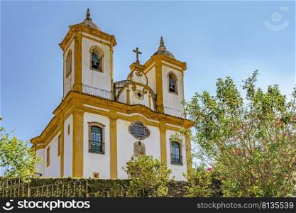 Historic church from the 18th century with colonial style on top of the hill in the city of Ouro Preto in Minas Gerais. Historic church with colonial style in Ouro Preto