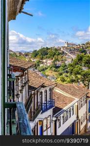 Historic city of Ouro Preto with its churches, hills and old colonial-style houses in the state of Minas Gerais. Citty of Ouro Preto with its churches, hills and houses