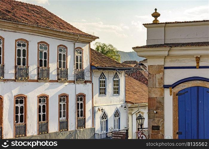 Historic colonial houses in the city of Ouro Preto with its typical facades of historic cities in the interior of the state of Minas Gerais, Brazil. Historic colonial houses in the city of Ouro Preto with its typical facades