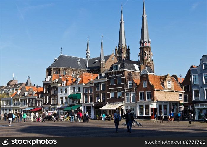 Historic Delft town centre with its variety of architecture and tourists