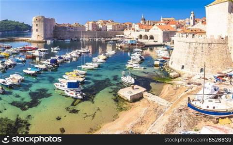 Historic Dubrovnik. Colorful harbor of Dubrovnik and stone architecture view, travel destination in Dalmatia region of Croatia