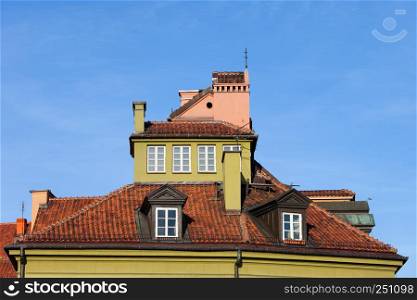 Historic house attic exterior in the Old Town of Warsaw, Poland.