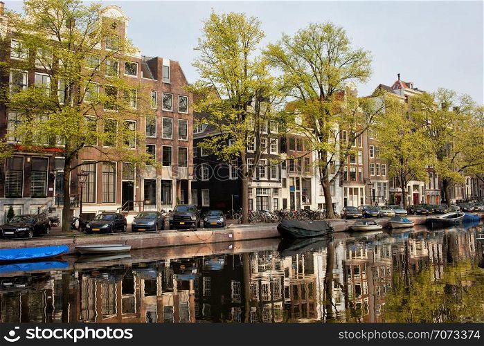 Historic houses along the Singel canal in spring, city of Amsterdam, Netherlands.