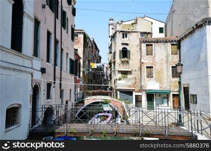 Historic houses, canals and lagoon in Venice