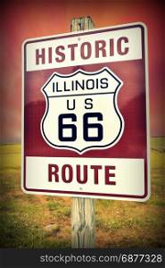 Historic Illinois Route 66 vintage sign with sunset.