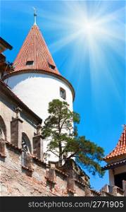 Historic medieval Krivoklat Castle in Czech Republic ( central Bohemia, near Prague ) and sunshine in blue sky