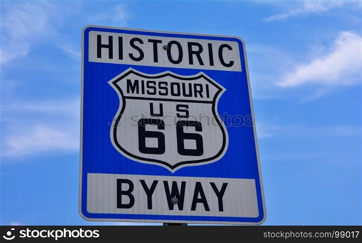 Historic route 66 highway sign in Missouri USA. Blue sky background