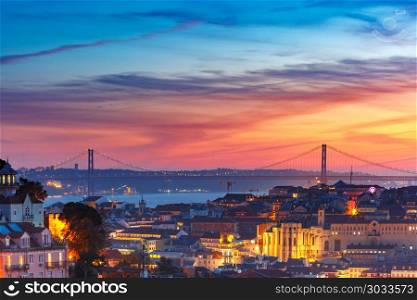 Historical centre of Lisbon at sunset, Portugal. Tagus River and 25 de Abril Bridge at scenic sunset, Lisbon, Portugal
