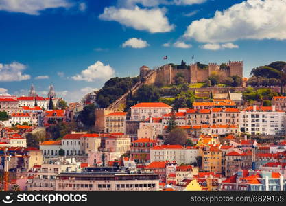 Historical centre of Lisbon on sunny day, Portugal. Aerial view of Castle of Saint George or Sao Jorge and the historical centre of Lisbon on the sunny afternoon, Lisbon, Portugal